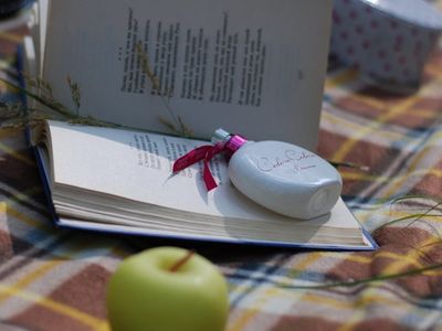 Open book and a bottle of water